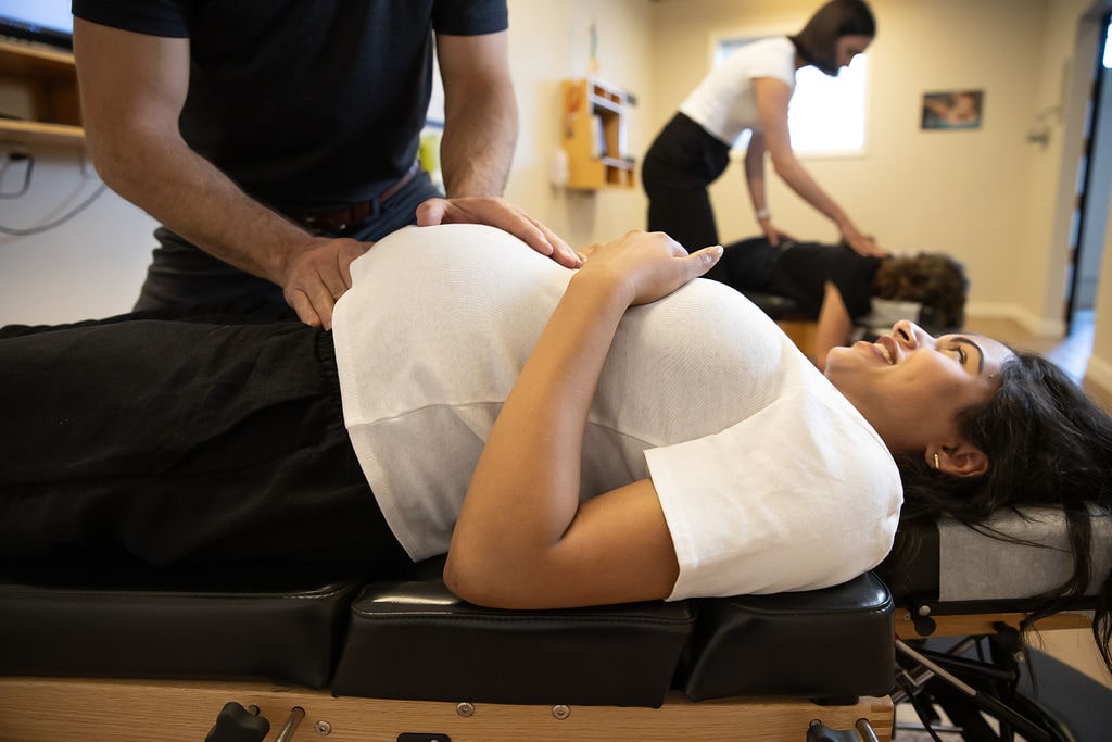 Women Getting Prenatal & Postnatal Chiropractic Treatment